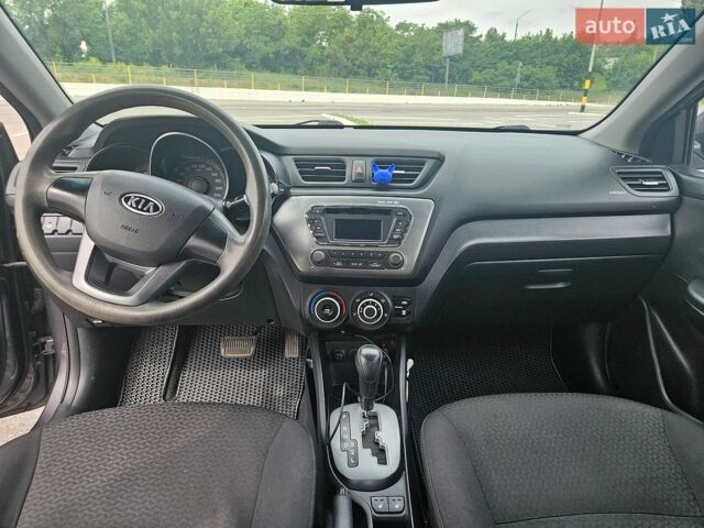 Сірий Кіа Ріо, об'ємом двигуна 1.6 л та пробігом 208 тис. км за 7300 $, фото 7 на Automoto.ua