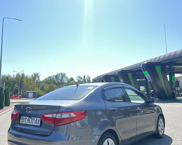 Серый Киа Рио, объемом двигателя 1.6 л и пробегом 101 тыс. км за 9900 $, фото 3 на Automoto.ua