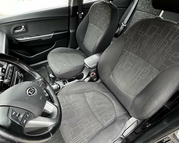Серый Киа Рио, объемом двигателя 1.59 л и пробегом 81 тыс. км за 8900 $, фото 12 на Automoto.ua