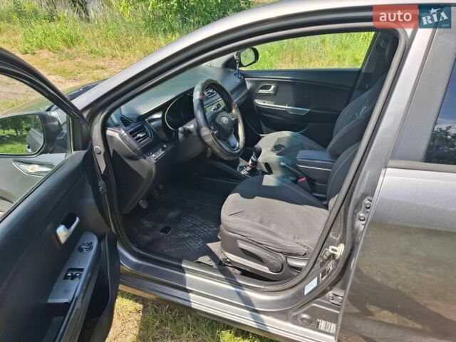 Серый Киа Рио, объемом двигателя 1.4 л и пробегом 235 тыс. км за 5600 $, фото 9 на Automoto.ua
