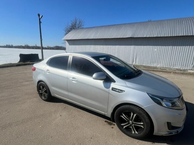 Сірий Кіа Ріо, об'ємом двигуна 1.4 л та пробігом 247 тис. км за 5300 $, фото 2 на Automoto.ua
