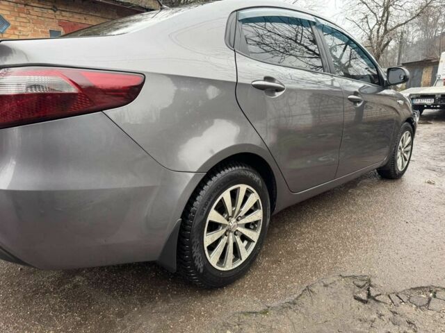 Сірий Кіа Ріо, об'ємом двигуна 1.4 л та пробігом 200 тис. км за 2850 $, фото 7 на Automoto.ua