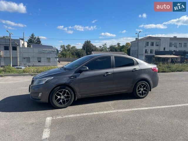 Сірий Кіа Ріо, об'ємом двигуна 1.4 л та пробігом 219 тис. км за 5900 $, фото 9 на Automoto.ua