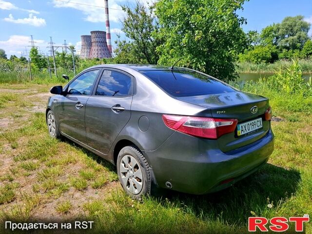 Серый Киа Рио, объемом двигателя 1.4 л и пробегом 235 тыс. км за 5600 $, фото 4 на Automoto.ua