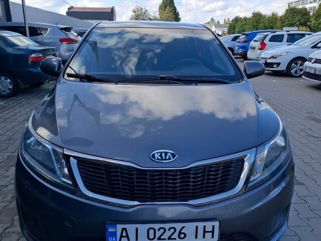 Серый Киа Рио, объемом двигателя 1.4 л и пробегом 131 тыс. км за 7900 $, фото 5 на Automoto.ua