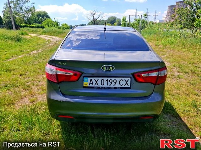 Серый Киа Рио, объемом двигателя 1.4 л и пробегом 235 тыс. км за 5600 $, фото 1 на Automoto.ua