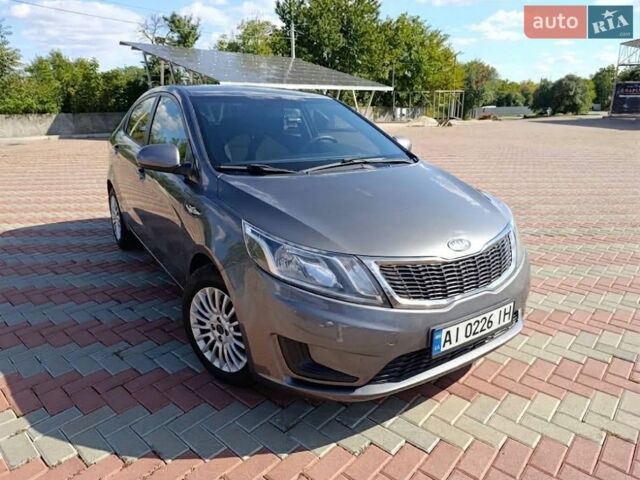 Сірий Кіа Ріо, об'ємом двигуна 1.4 л та пробігом 131 тис. км за 7500 $, фото 2 на Automoto.ua