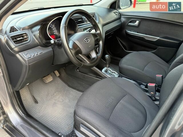 Серый Киа Рио, объемом двигателя 1.4 л и пробегом 147 тыс. км за 8550 $, фото 8 на Automoto.ua