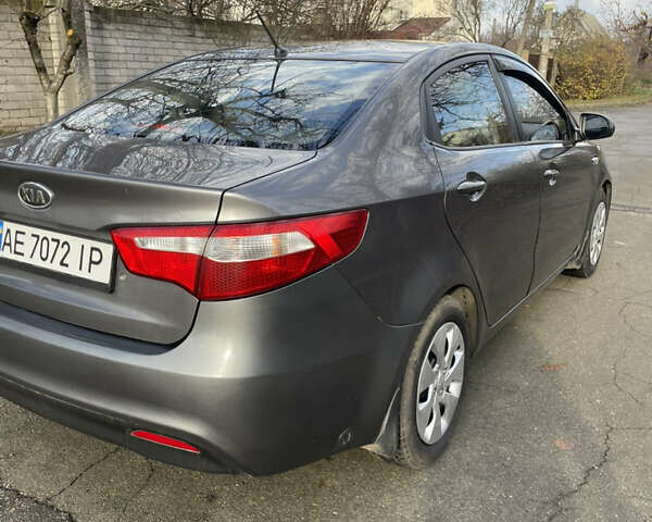 Серый Киа Рио, объемом двигателя 1.4 л и пробегом 167 тыс. км за 5999 $, фото 3 на Automoto.ua