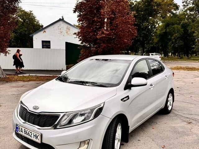 Серый Киа Рио, объемом двигателя 1.4 л и пробегом 247 тыс. км за 6900 $, фото 2 на Automoto.ua