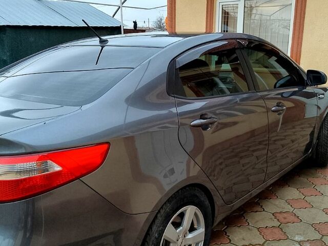 Сірий Кіа Ріо, об'ємом двигуна 1.4 л та пробігом 206 тис. км за 7800 $, фото 3 на Automoto.ua
