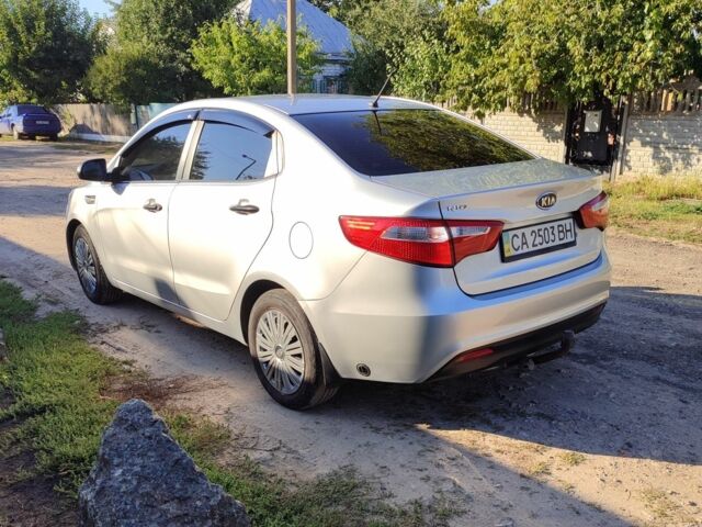 Сірий Кіа Ріо, об'ємом двигуна 1.4 л та пробігом 216 тис. км за 6813 $, фото 3 на Automoto.ua