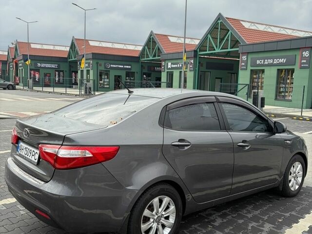 Сірий Кіа Ріо, об'ємом двигуна 1.4 л та пробігом 110 тис. км за 6999 $, фото 5 на Automoto.ua
