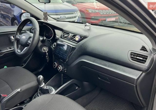 Сірий Кіа Ріо, об'ємом двигуна 1.4 л та пробігом 190 тис. км за 7500 $, фото 10 на Automoto.ua