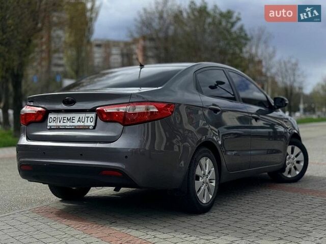 Серый Киа Рио, объемом двигателя 1.59 л и пробегом 206 тыс. км за 7499 $, фото 3 на Automoto.ua