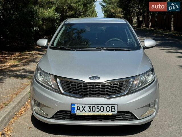 Сірий Кіа Ріо, об'ємом двигуна 1.4 л та пробігом 94 тис. км за 8799 $, фото 6 на Automoto.ua