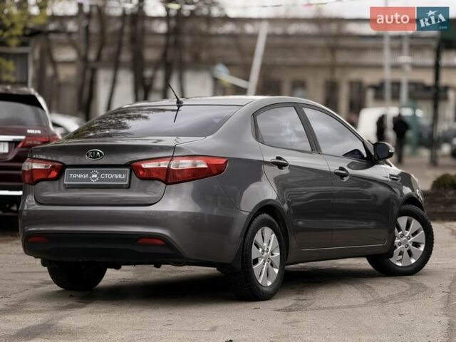 Серый Киа Рио, объемом двигателя 1.59 л и пробегом 180 тыс. км за 7300 $, фото 1 на Automoto.ua
