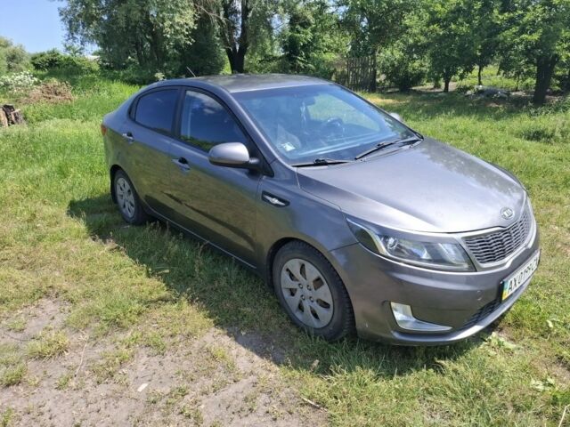 Сірий Кіа Ріо, об'ємом двигуна 1.4 л та пробігом 235 тис. км за 5800 $, фото 1 на Automoto.ua