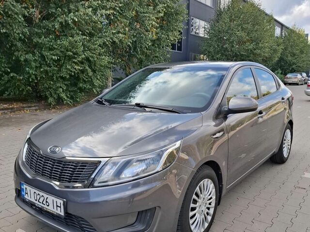 Серый Киа Рио, объемом двигателя 1.4 л и пробегом 131 тыс. км за 7900 $, фото 1 на Automoto.ua