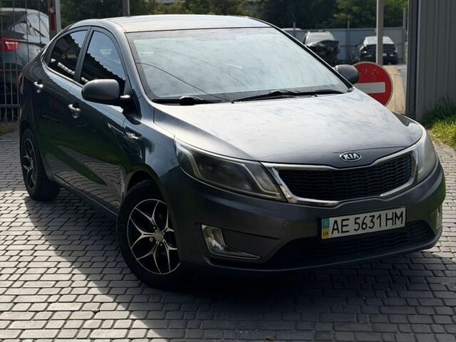 Сірий Кіа Ріо, об'ємом двигуна 1.4 л та пробігом 220 тис. км за 6700 $, фото 1 на Automoto.ua