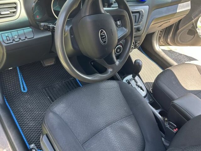 Серый Киа Рио, объемом двигателя 1.6 л и пробегом 250 тыс. км за 8299 $, фото 12 на Automoto.ua
