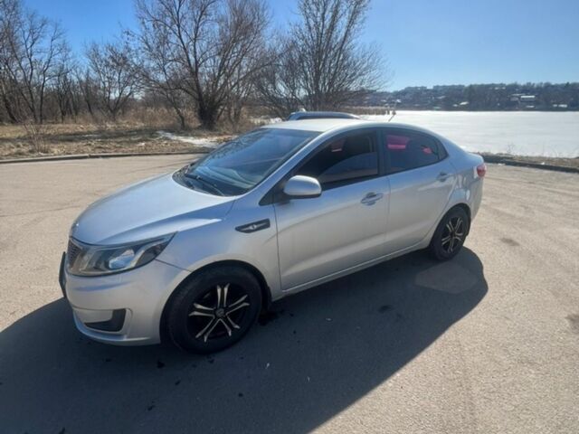 Сірий Кіа Ріо, об'ємом двигуна 1.4 л та пробігом 247 тис. км за 5300 $, фото 1 на Automoto.ua