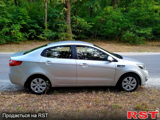 Сірий Кіа Ріо, об'ємом двигуна 1.4 л та пробігом 230 тис. км за 5750 $, фото 1 на Automoto.ua