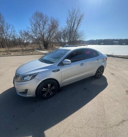 Серый Киа Рио, объемом двигателя 1.4 л и пробегом 247 тыс. км за 6400 $, фото 1 на Automoto.ua