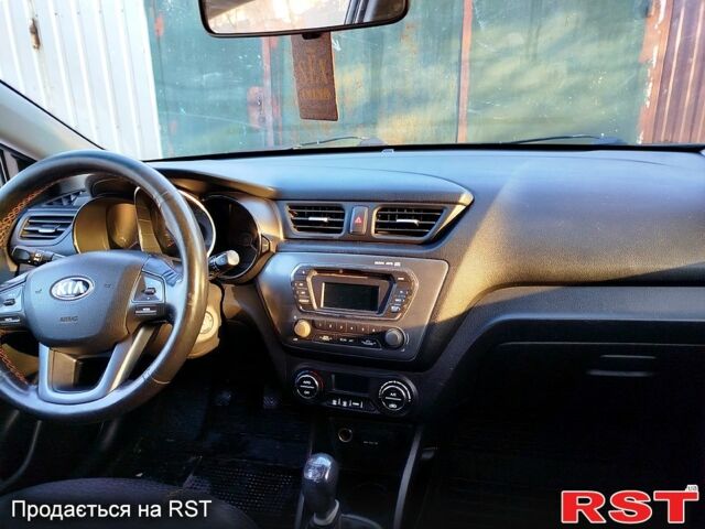 Серый Киа Рио, объемом двигателя 1.4 л и пробегом 24500 тыс. км за 5500 $, фото 7 на Automoto.ua