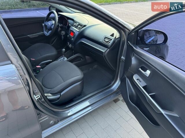 Серый Киа Рио, объемом двигателя 1.4 л и пробегом 87 тыс. км за 8950 $, фото 48 на Automoto.ua