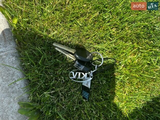Серый Киа Рио, объемом двигателя 1.4 л и пробегом 30 тыс. км за 9900 $, фото 8 на Automoto.ua