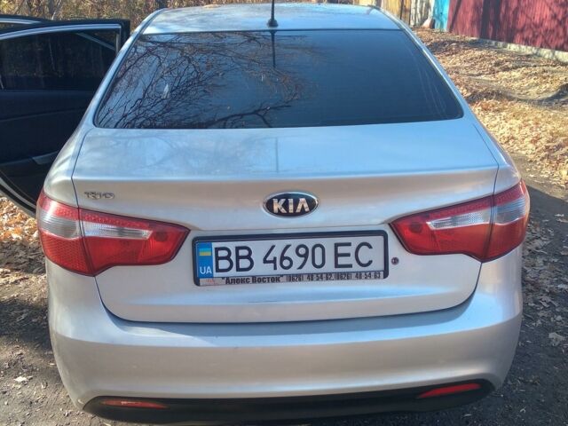Серый Киа Рио, объемом двигателя 1.4 л и пробегом 127 тыс. км за 9300 $, фото 4 на Automoto.ua