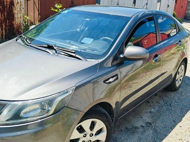 Серый Киа Рио, объемом двигателя 1.4 л и пробегом 190 тыс. км за 7000 $, фото 2 на Automoto.ua
