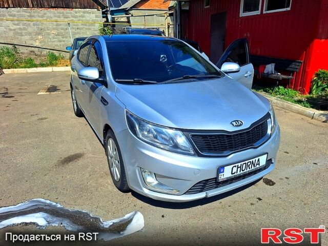 Сірий Кіа Ріо, об'ємом двигуна 1.6 л та пробігом 157 тис. км за 8500 $, фото 11 на Automoto.ua