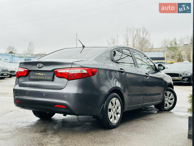 Серый Киа Рио, объемом двигателя 1.4 л и пробегом 245 тыс. км за 5900 $, фото 1 на Automoto.ua