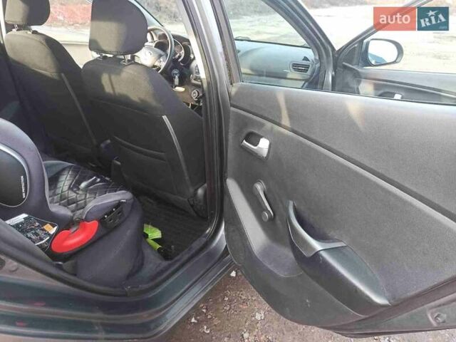 Серый Киа Рио, объемом двигателя 1.4 л и пробегом 70 тыс. км за 9000 $, фото 54 на Automoto.ua