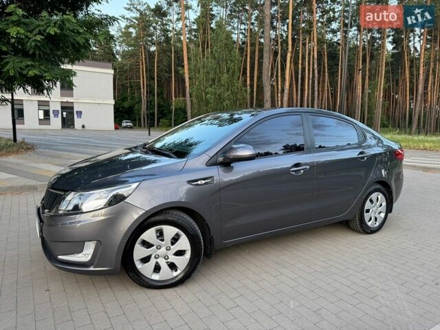 Серый Киа Рио, объемом двигателя 1.4 л и пробегом 87 тыс. км за 8950 $, фото 5 на Automoto.ua