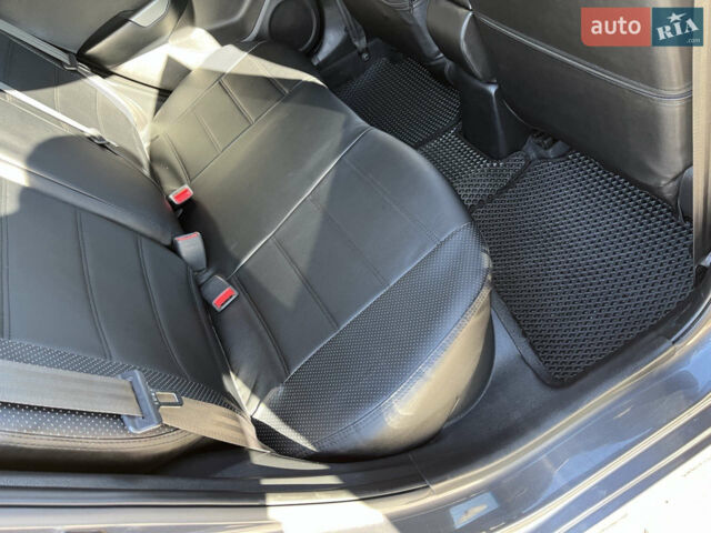 Серый Киа Рио, объемом двигателя 1.4 л и пробегом 73 тыс. км за 8800 $, фото 9 на Automoto.ua