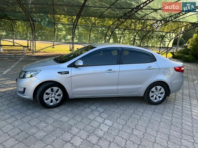 Сірий Кіа Ріо, об'ємом двигуна 1.4 л та пробігом 186 тис. км за 6999 $, фото 9 на Automoto.ua