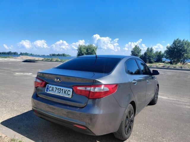 Серый Киа Рио, объемом двигателя 1.4 л и пробегом 98 тыс. км за 8564 $, фото 1 на Automoto.ua
