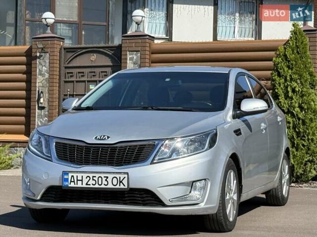 Серый Киа Рио, объемом двигателя 1.59 л и пробегом 131 тыс. км за 8800 $, фото 3 на Automoto.ua