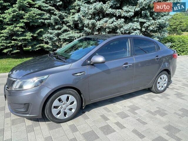 Сірий Кіа Ріо, об'ємом двигуна 1.6 л та пробігом 148 тис. км за 8300 $, фото 22 на Automoto.ua