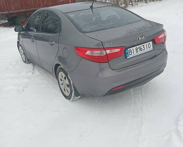 Серый Киа Рио, объемом двигателя 1.4 л и пробегом 300 тыс. км за 5850 $, фото 2 на Automoto.ua