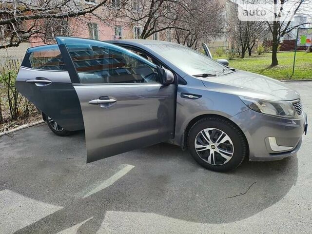 Сірий Кіа Ріо, об'ємом двигуна 1.59 л та пробігом 126 тис. км за 8500 $, фото 3 на Automoto.ua