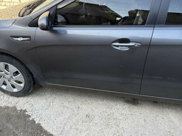 Серый Киа Рио, объемом двигателя 1.4 л и пробегом 104 тыс. км за 7000 $, фото 2 на Automoto.ua