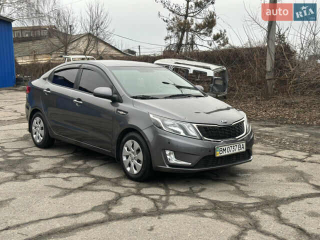 Серый Киа Рио, объемом двигателя 1.4 л и пробегом 43 тыс. км за 10500 $, фото 4 на Automoto.ua