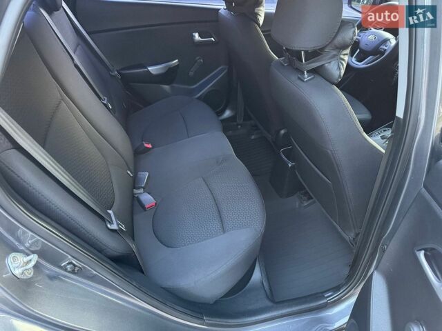 Серый Киа Рио, объемом двигателя 1.4 л и пробегом 87 тыс. км за 8950 $, фото 59 на Automoto.ua