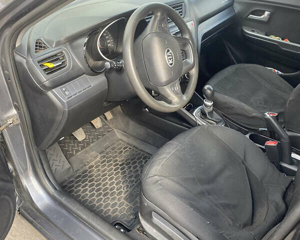 Серый Киа Рио, объемом двигателя 1.4 л и пробегом 205 тыс. км за 6500 $, фото 1 на Automoto.ua