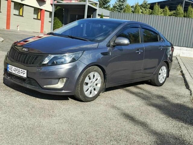 Серый Киа Рио, объемом двигателя 1.6 л и пробегом 177 тыс. км за 6904 $, фото 2 на Automoto.ua
