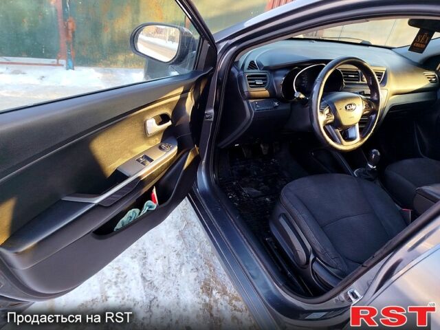 Серый Киа Рио, объемом двигателя 1.4 л и пробегом 24500 тыс. км за 5500 $, фото 4 на Automoto.ua